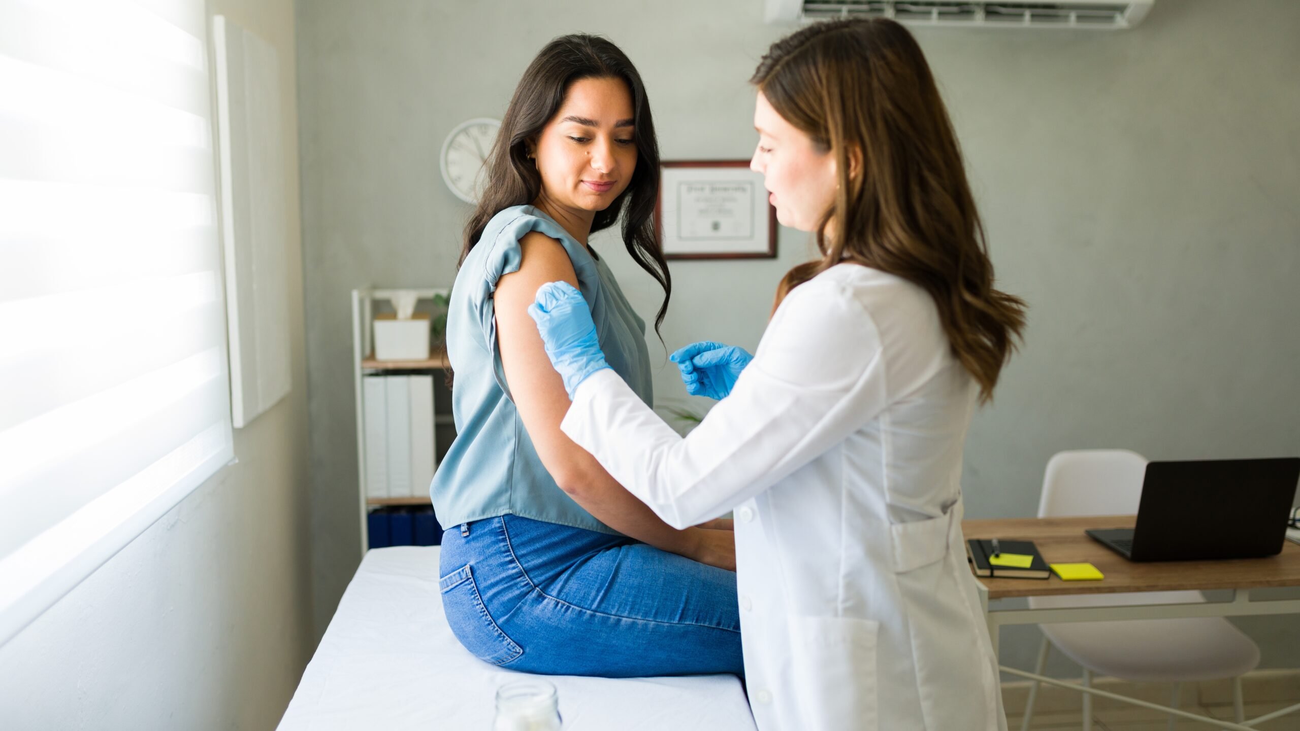 Child with bandage after vaccination