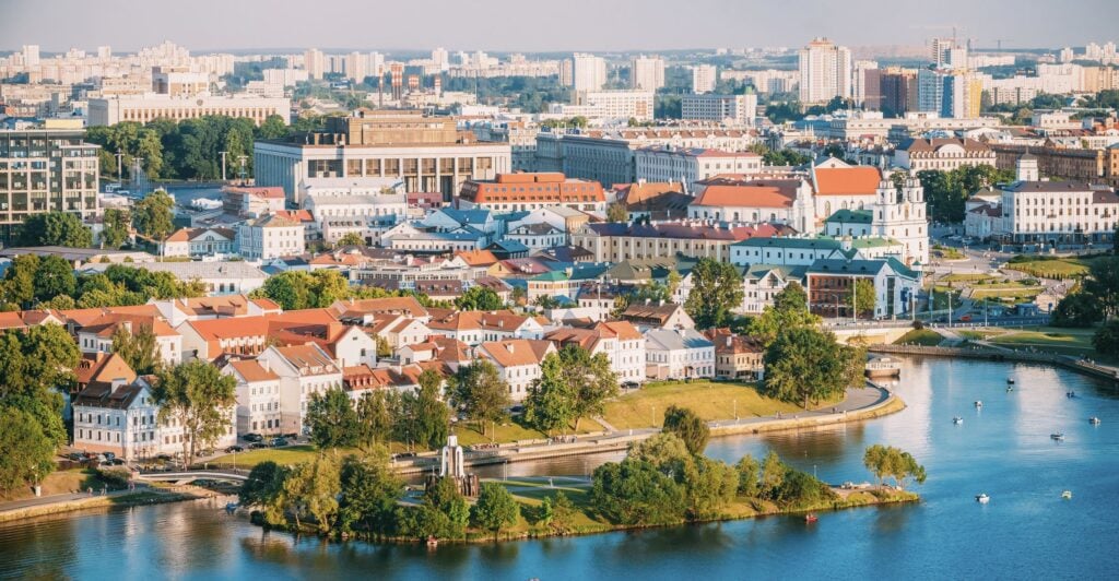 Aerial View, Cityscape Of Minsk, Belarus. Summer Season, Sunset Time. Panorama Of Nemiga District
