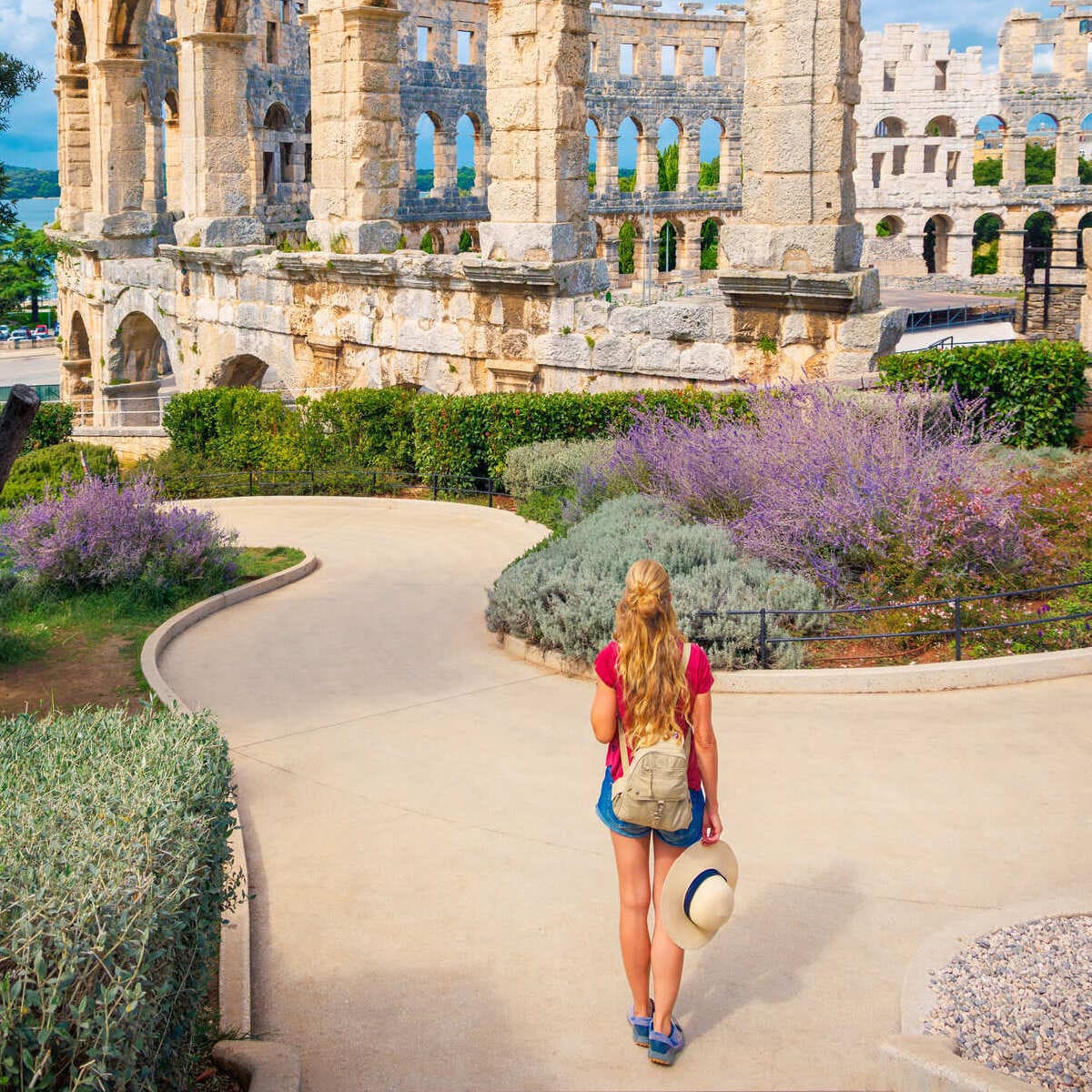 Female Tourist Exploring Around Pula Arena, Croatia