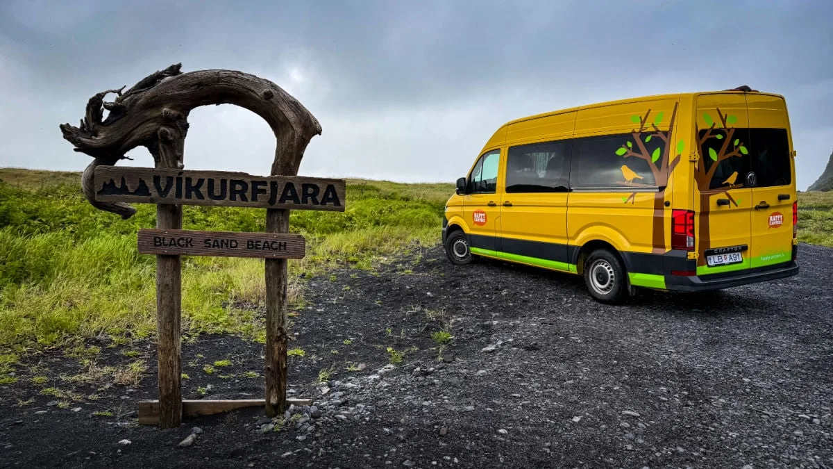 Happy Camper Van in Iceland at Black Sand Beach