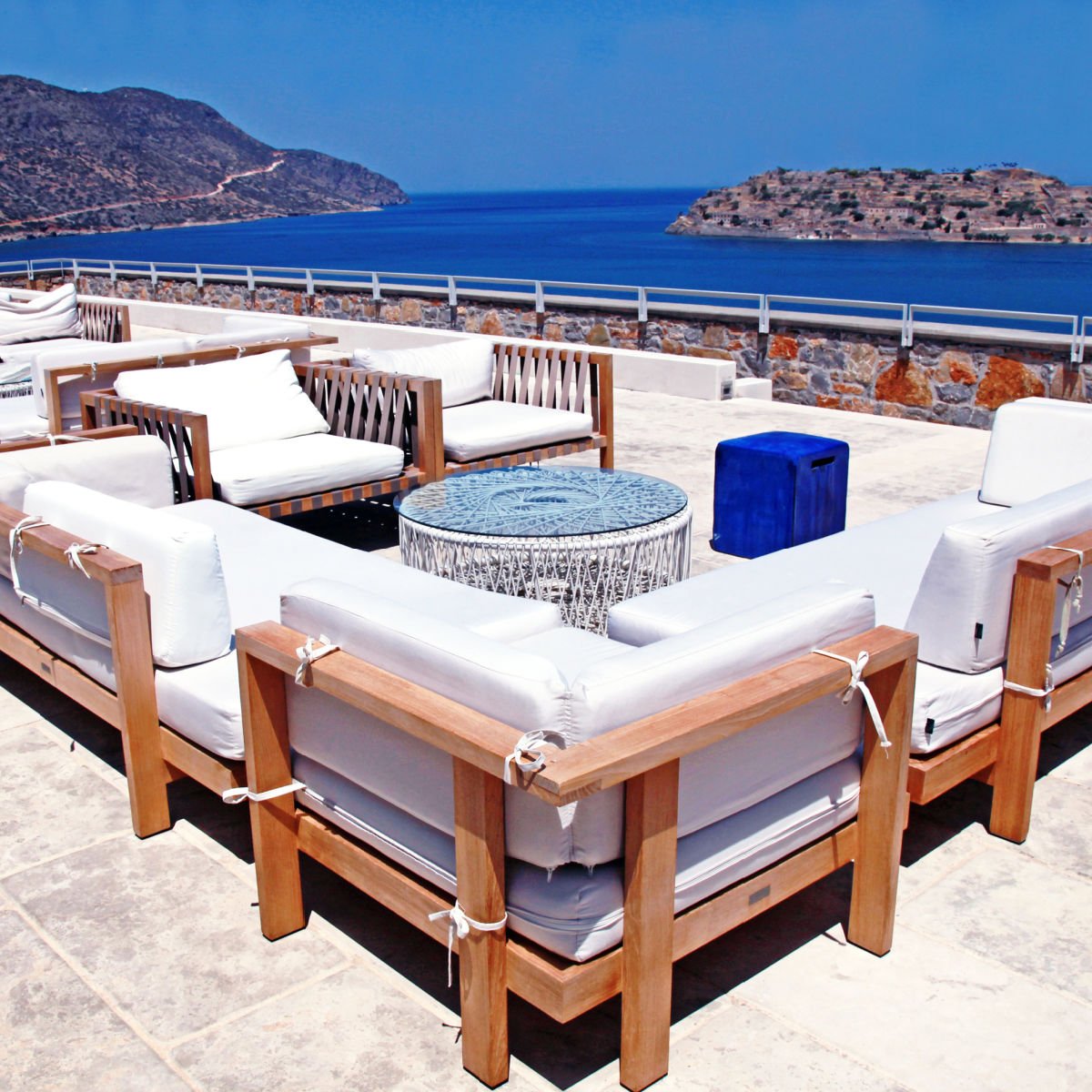 Outdoor lounge furniture in a luxury resort Elounda
