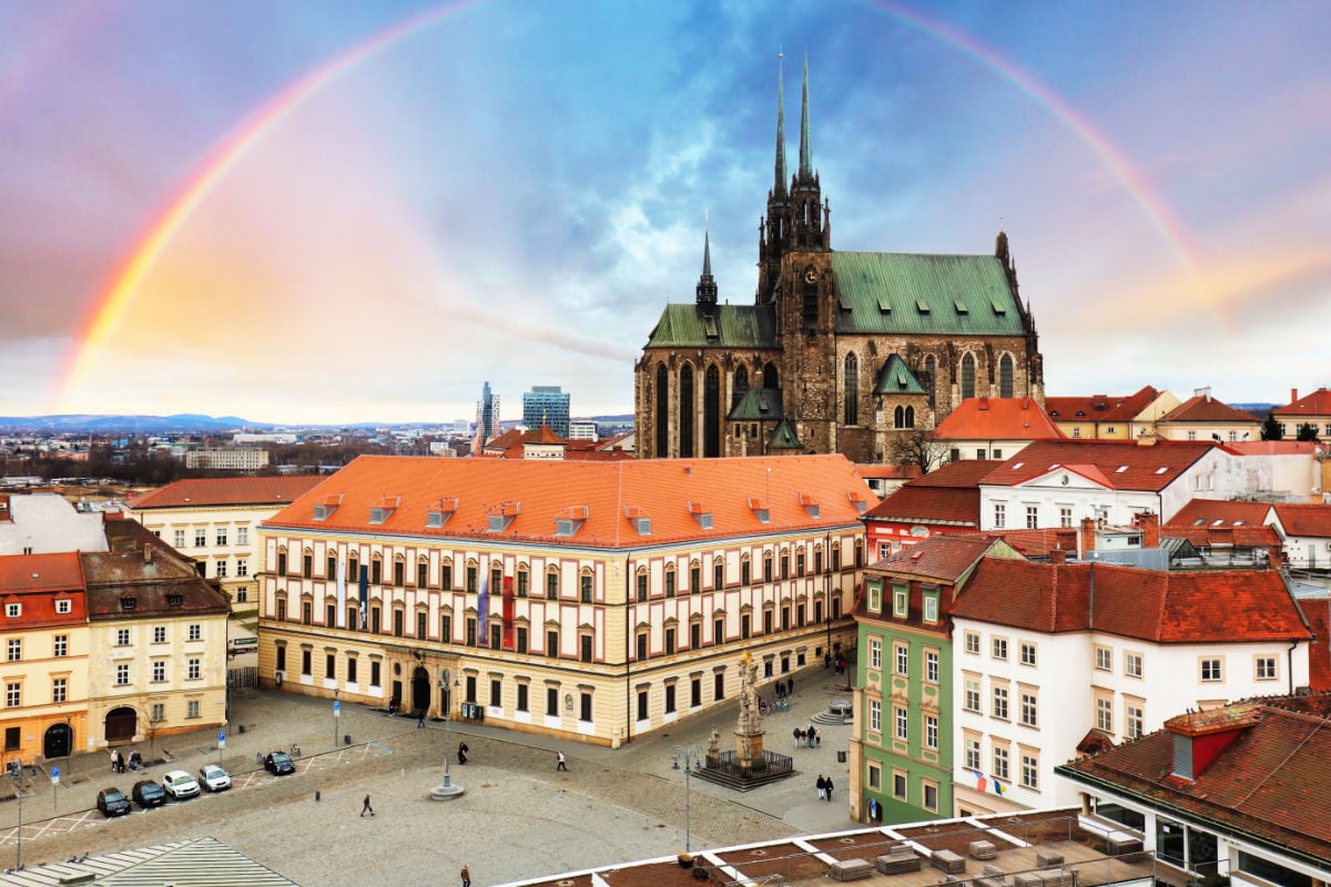 Rainbow over Zerny trh square in the old town of Brno - Moravia, Czech Republic