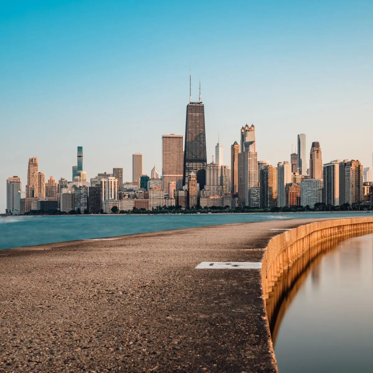 Skyline of Chicago towering over Lake Michigan