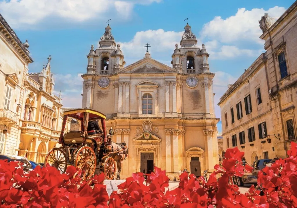 Wide view of Saint Paul Cathedral architecture in Mdina village of Malta on a sunny day in Europe
