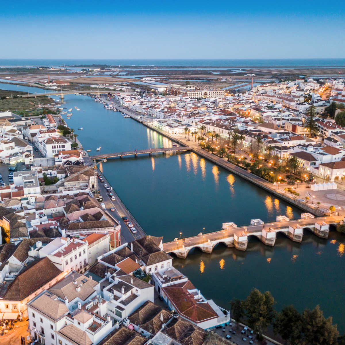 This Sunny Lesser Known Coastal City Is The 'Venice' Of Portugal Aerial view of Tavira, Portugal canal and townscape
