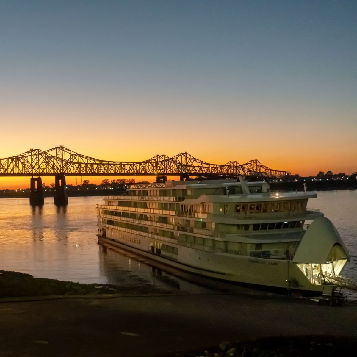 American Cruise Lines ship at sunset