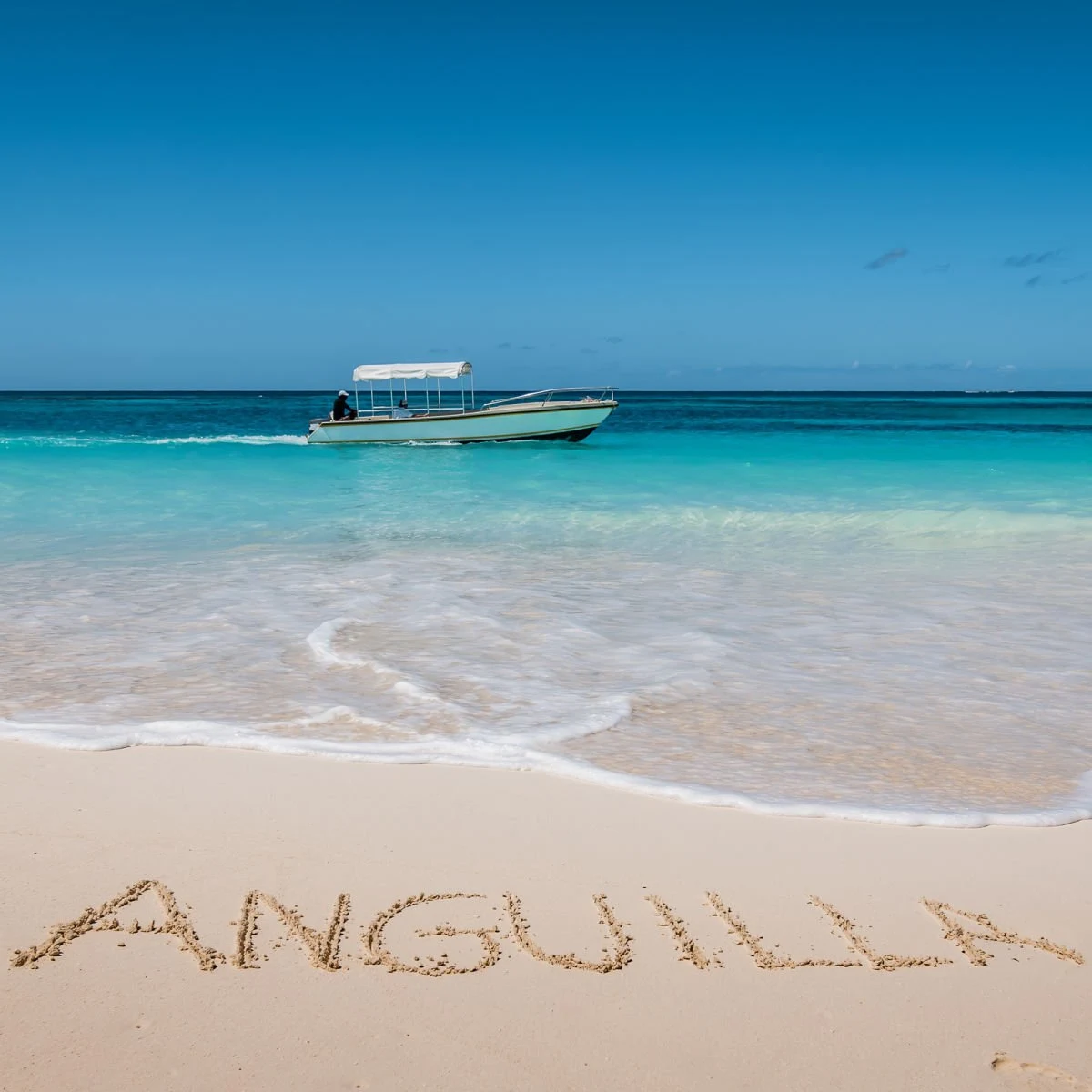 Anguilla written in sand