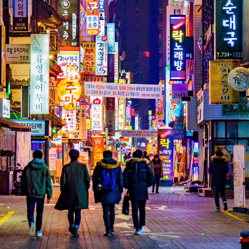 Neon-lit walkway in Seoul