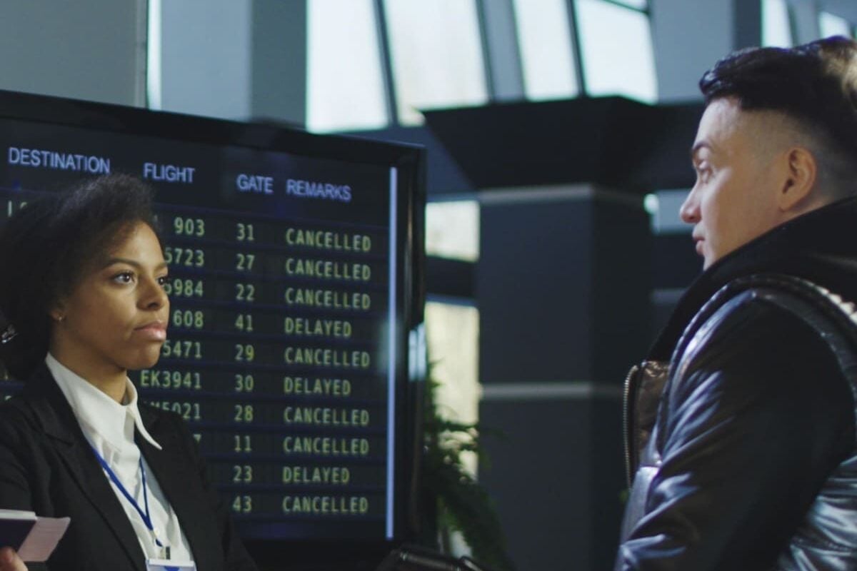 Passenger Getting His Fingerprints Scanned At The Airport
