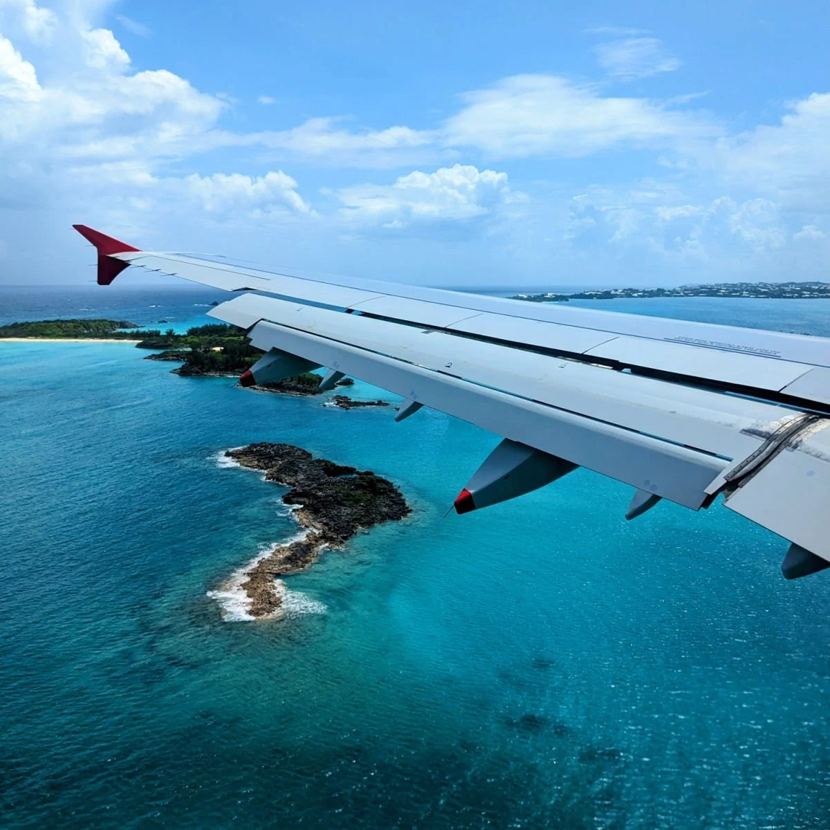 Plane wing over Bermuda