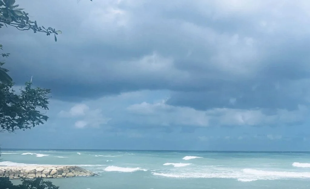Storm clouds and strong surf in Jamaica