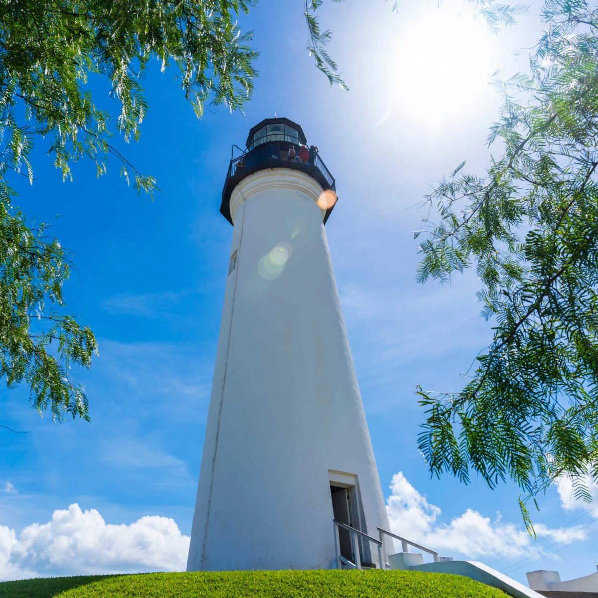 This Secret Beach Town Is The South's Most Underrated Winter Getaway Towering lighthouse in Port Isabel, TX