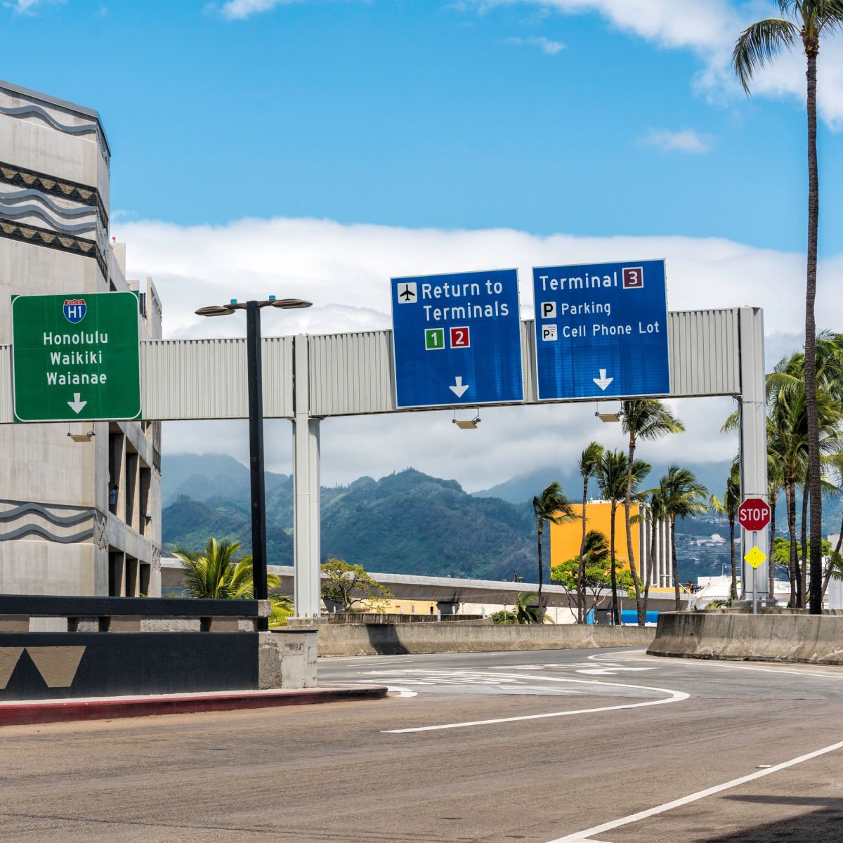 Travelers Can Now Reach Hawaii's Most Popular Airport By Train For The First Time Ever Traffic signs at HNL airport