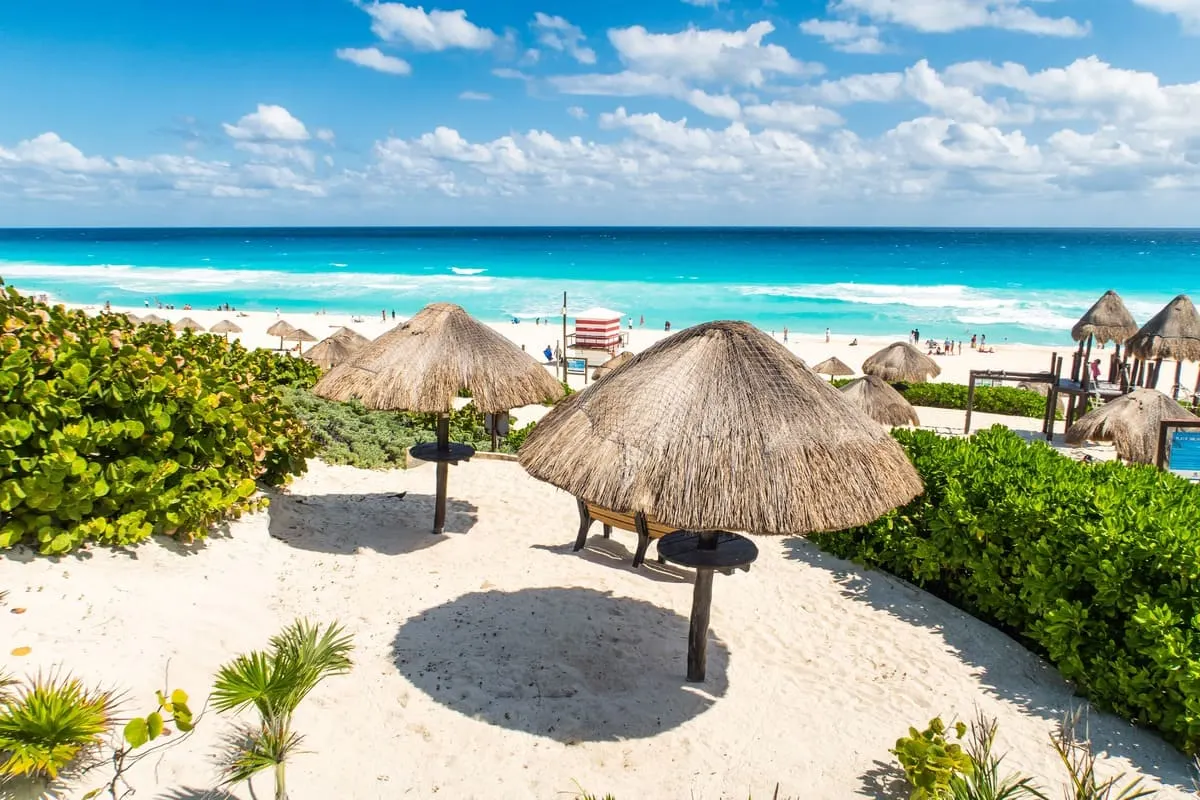 Why Tourists Are Flocking To This Quieter, Beautiful Beach Region Near Cancun Panoramic View Of A Beach In Costa Mujeres, Mexico