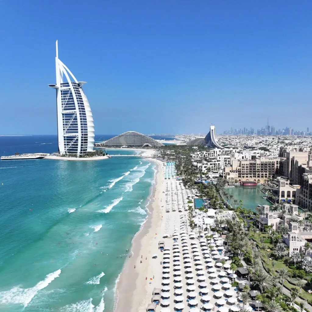 Beach in Dubai backdropped by skyline