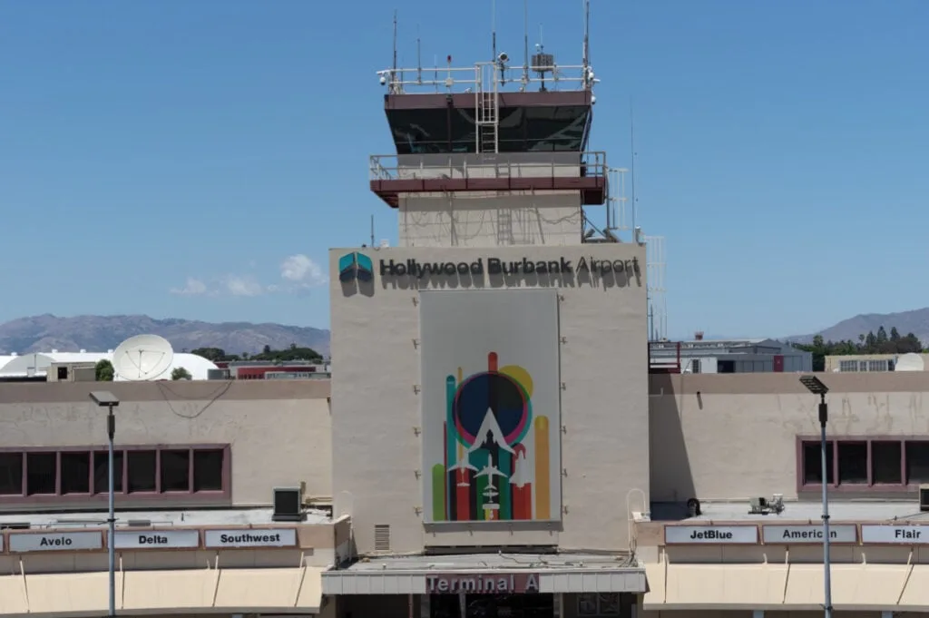 Burbank, California, USA - image of the Hollywood Burbank Airport shown on a sunny day with blue sky.
