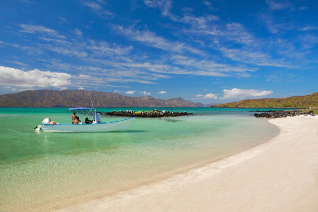 LORETO, MEXICO A pleasure boat stops at the turquoise waters of Coronado Beach in the Sea of Cortez in Loreto, Mexico