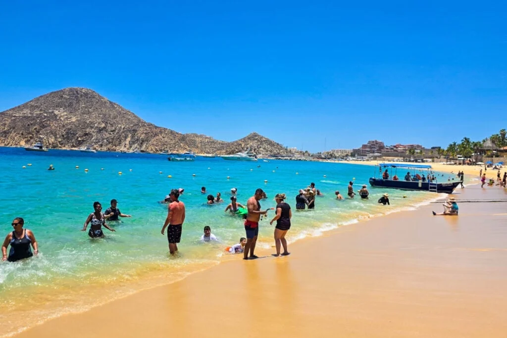 Tourists on Cabo beach 