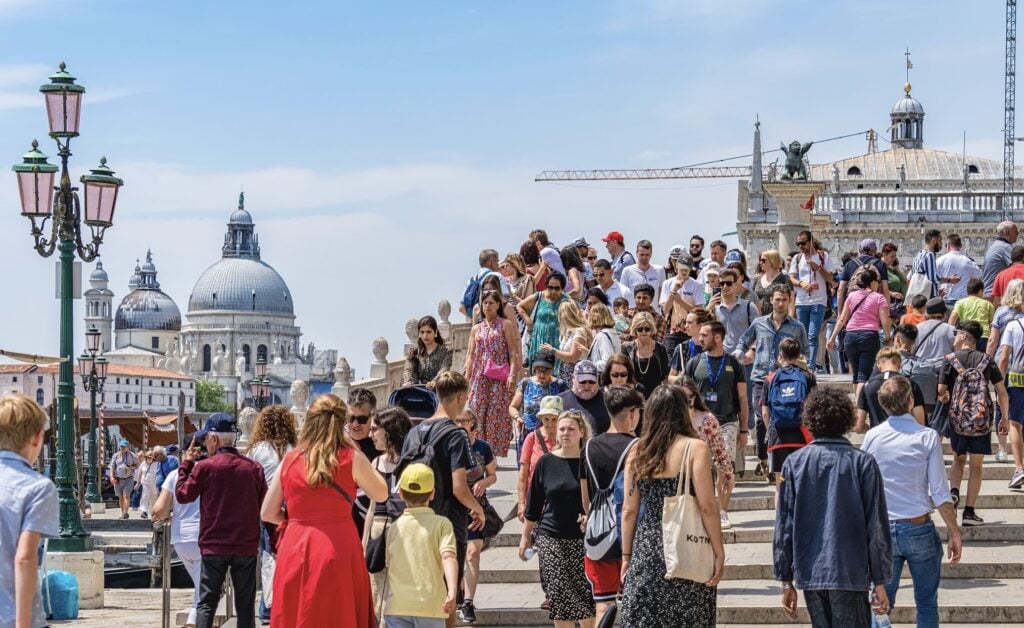 Crowded venice tourists exploring