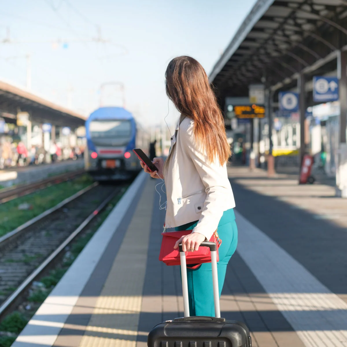 Female passenger at undisclosed train station