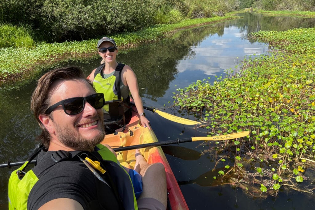 Tyler Fox & Liz Fox kayaking slough in Bellevue