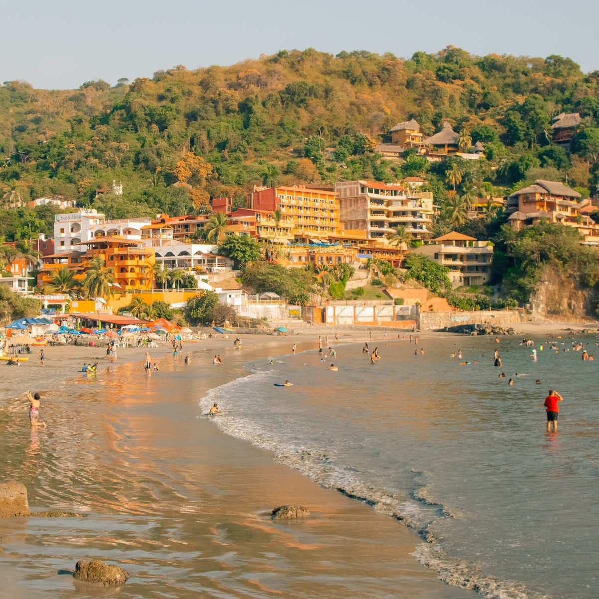 People On The Beach In Ixtapa, Guerrero State, Mexico