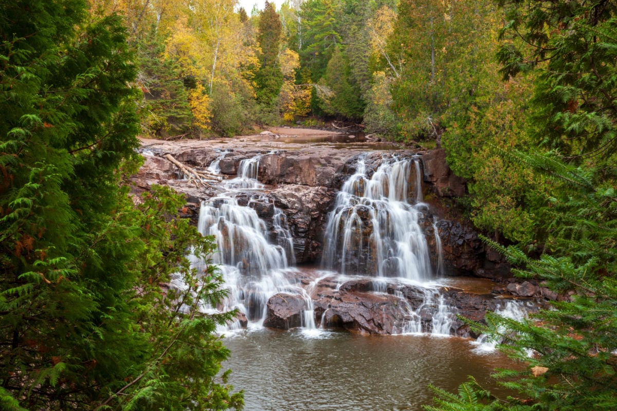 The high falls at Gooseberry Falls State Park in Minnesota on an autumn day