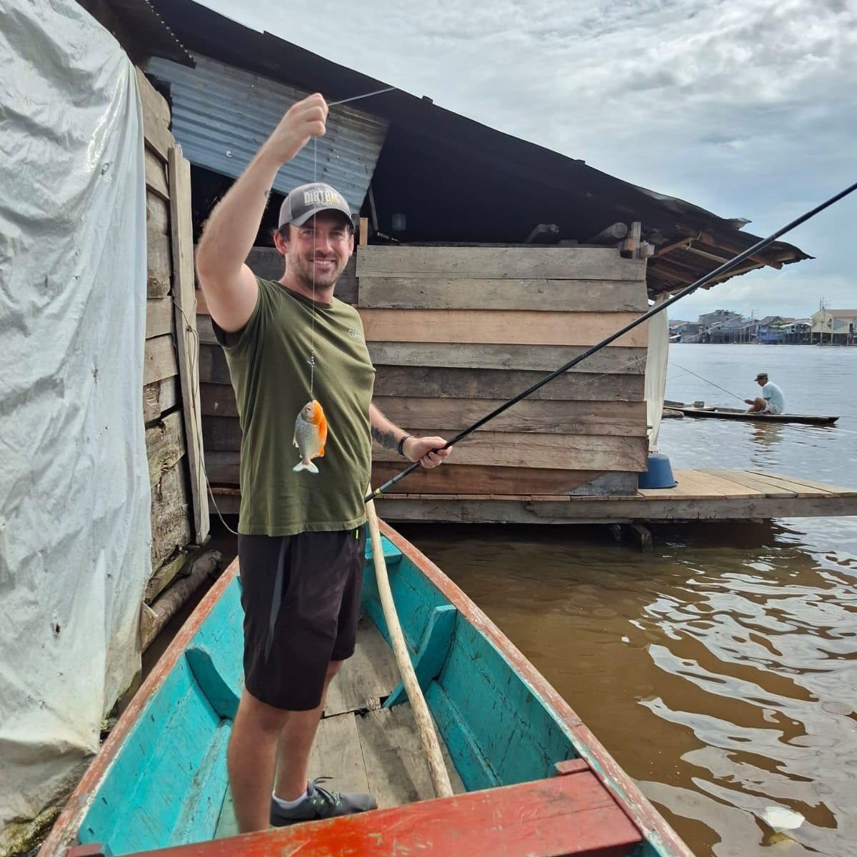 Travel Off Path writer Sam Sears piranha fishing in Iquitos, Peru