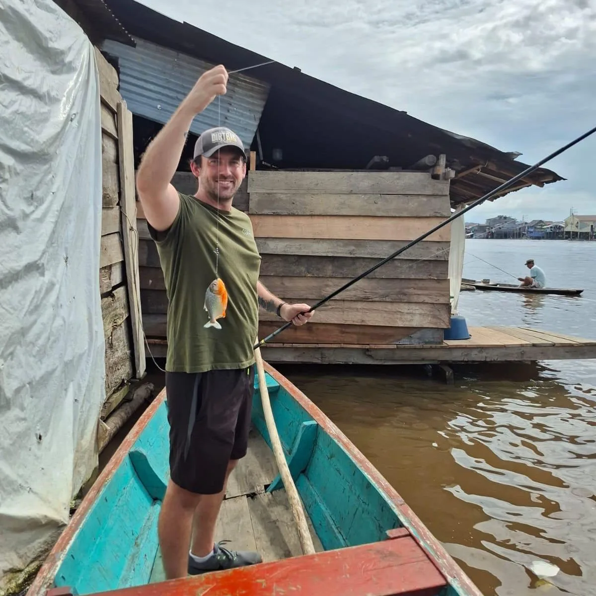 Travel Off Path writer Sam Sears piranha fishing in Iquitos, Peru