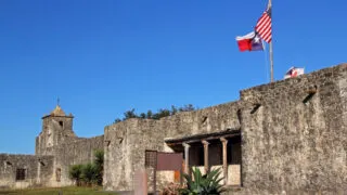 An old orange San Francisco cable car