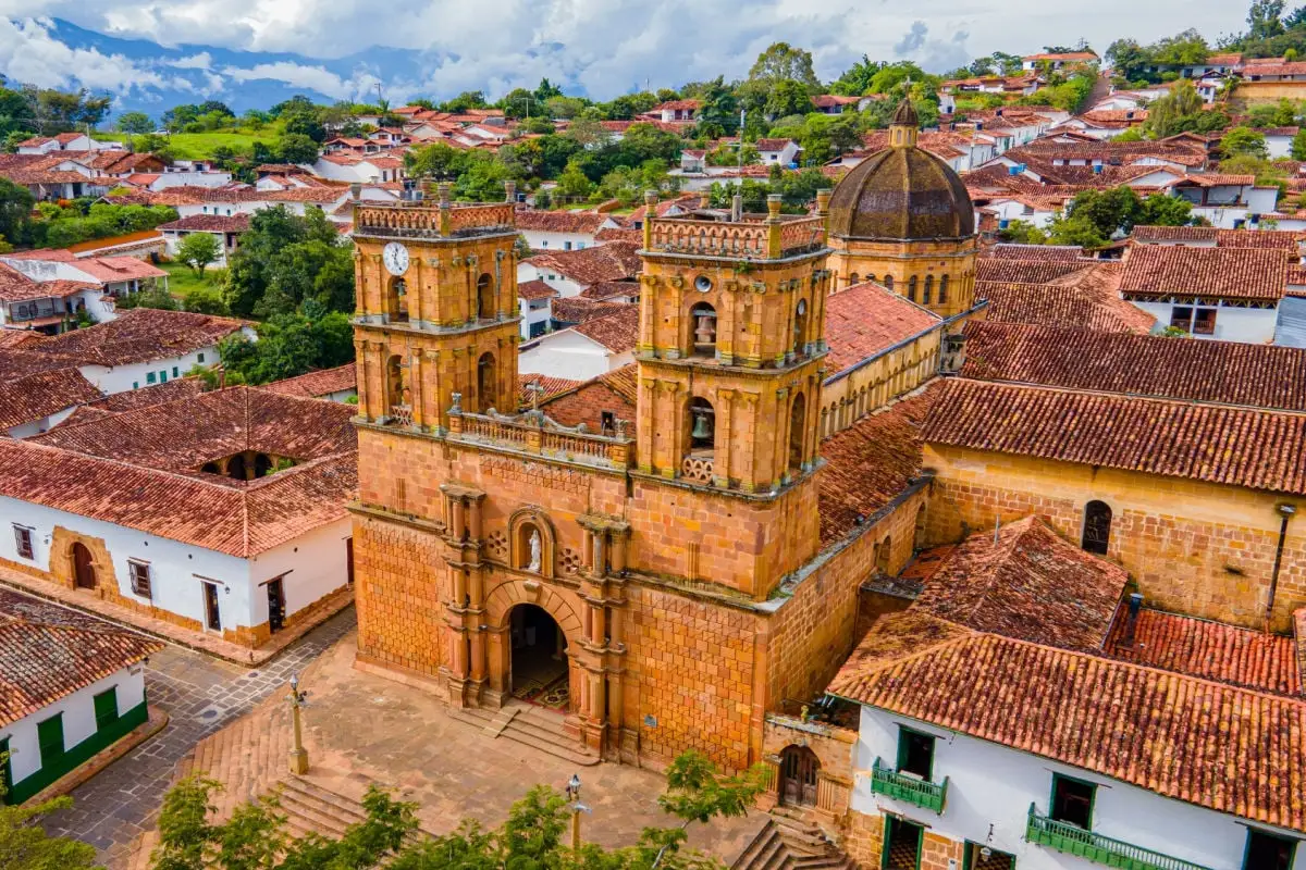 Aerial view of Barichara, Santander, Colombia, showcasing historic architecture and vibrant greenery