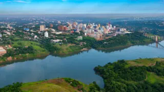 Aerial view of the Paraguayan city of Ciudad del Este and Friendship Bridge, connecting Paraguay and Brazil through the border over the Parana River
