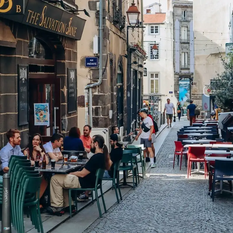 An Alley In Clermont-Ferrand Old Town Lined With Bars, France