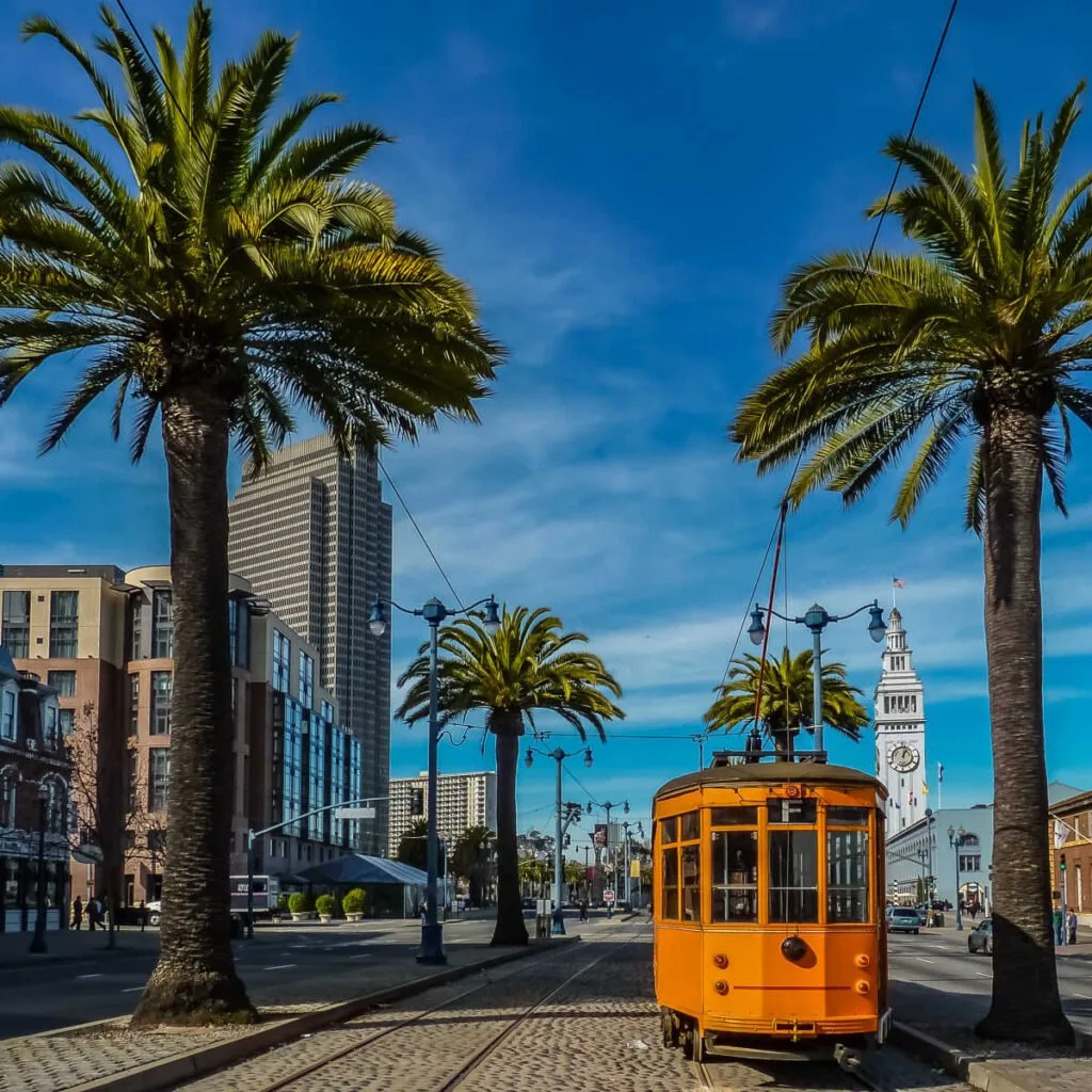 An old orange San Francisco cable car