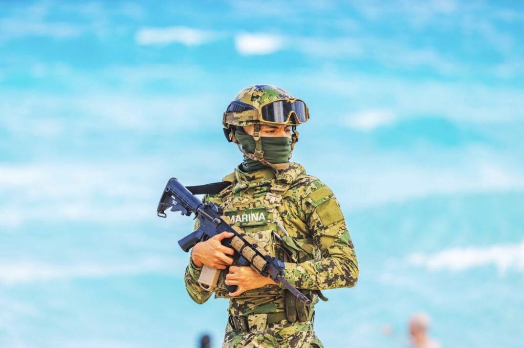 Military-soldier-on-Playa-Del-Carmen-Beach-