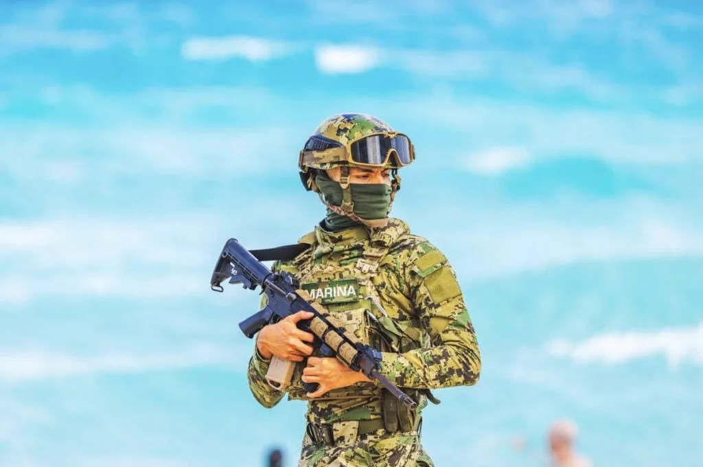 Military-soldier-on-Playa-Del-Carmen-Beach-