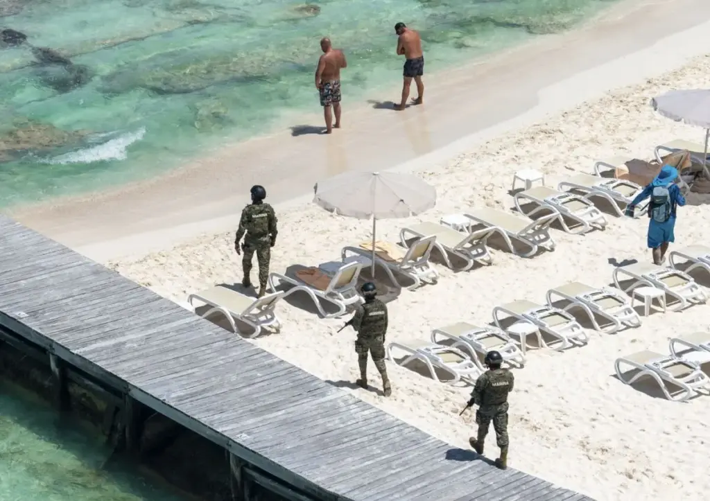 Military-soldier-on-Playa-Del-Carmen-Beach-