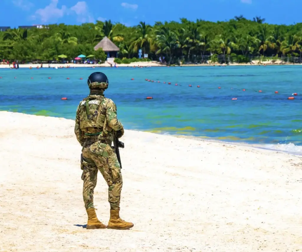 Military-soldier-on-Playa-Del-Carmen-Beach