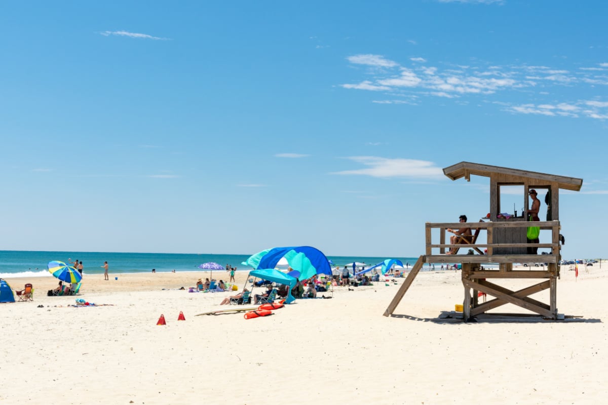 OCRACOKE, NORTH CAROLINA Lifeguards watch the ocean on the Ocracoke lifeguarded beach on a tranquil summer day.