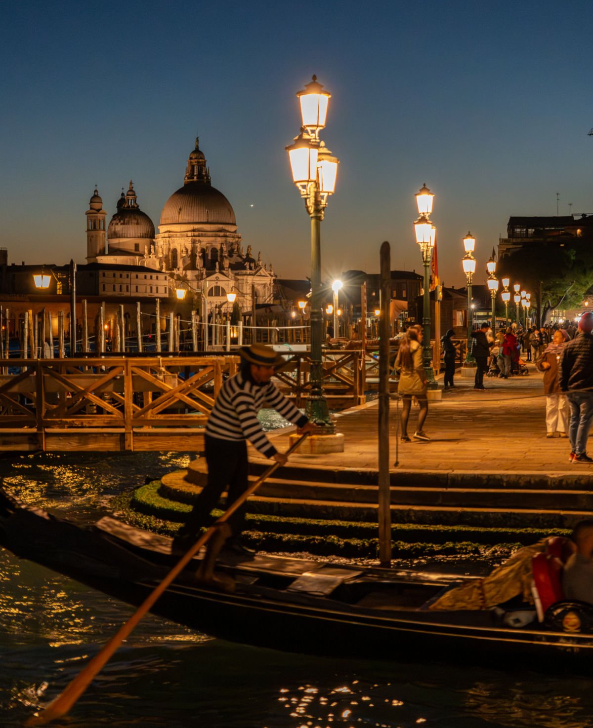 Photo by Tyler Fox, couple going for a gondola ride in Venice, Italy