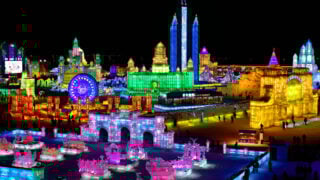 City build of ice in Harbin, China at night