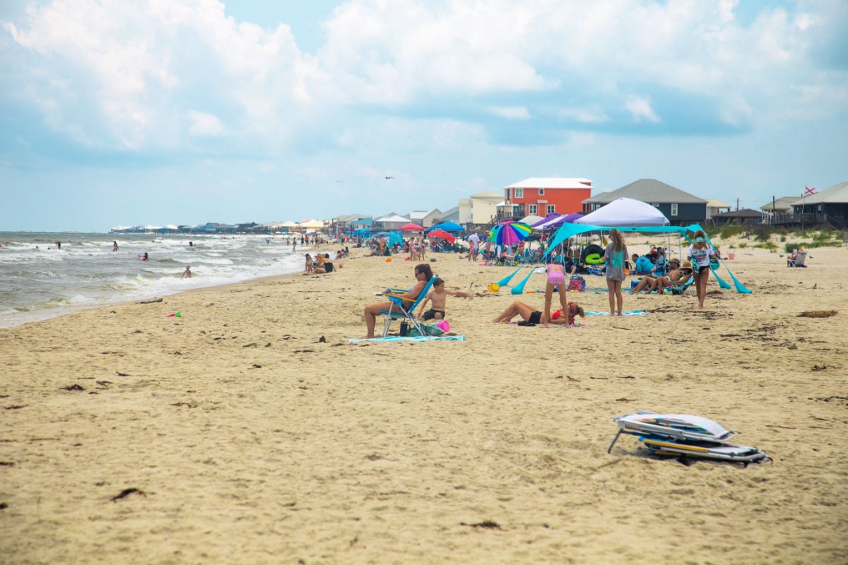 A busy summer beach day in Dauphin Island, Alabama.