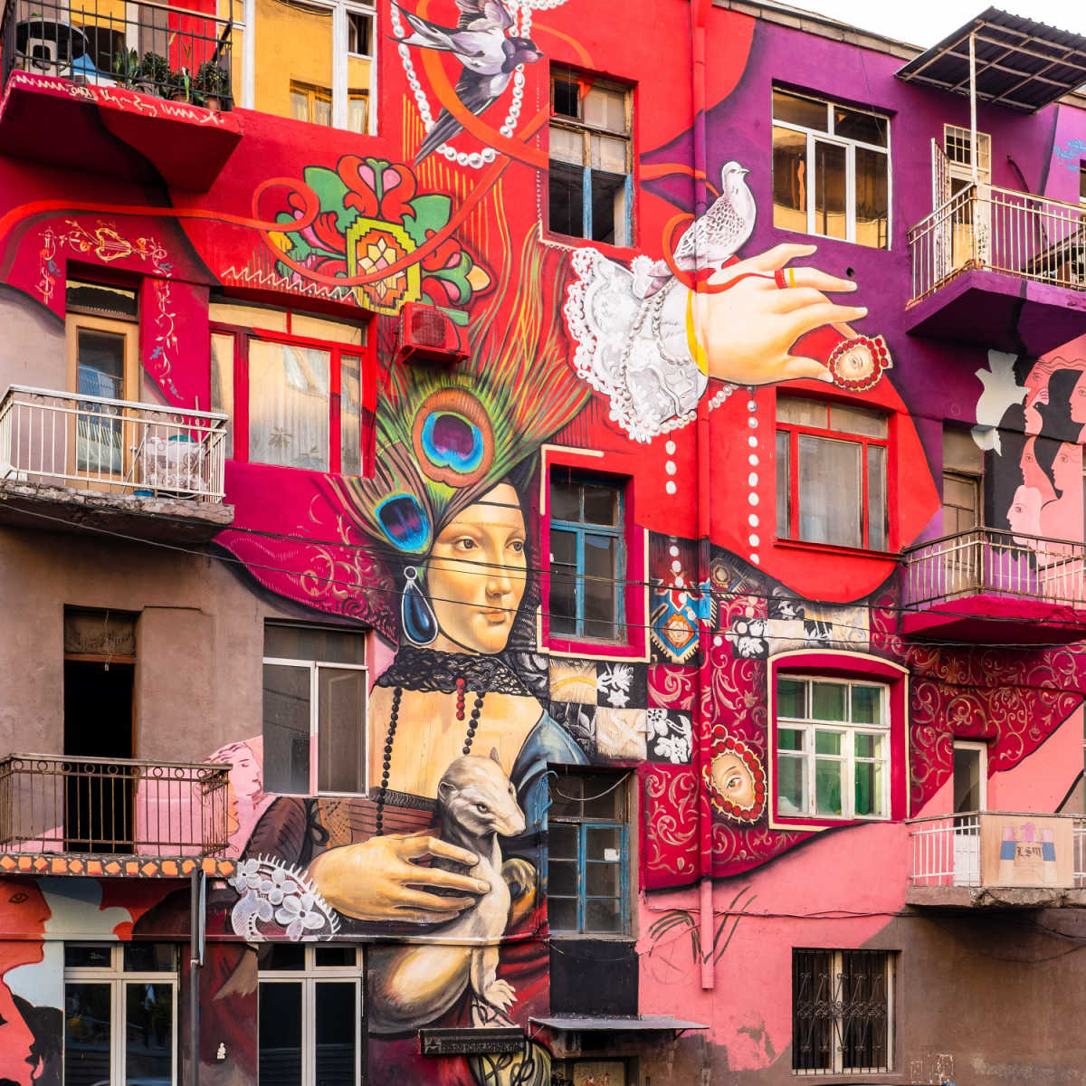 Art mural on the pink building in Yerevan, Armenia