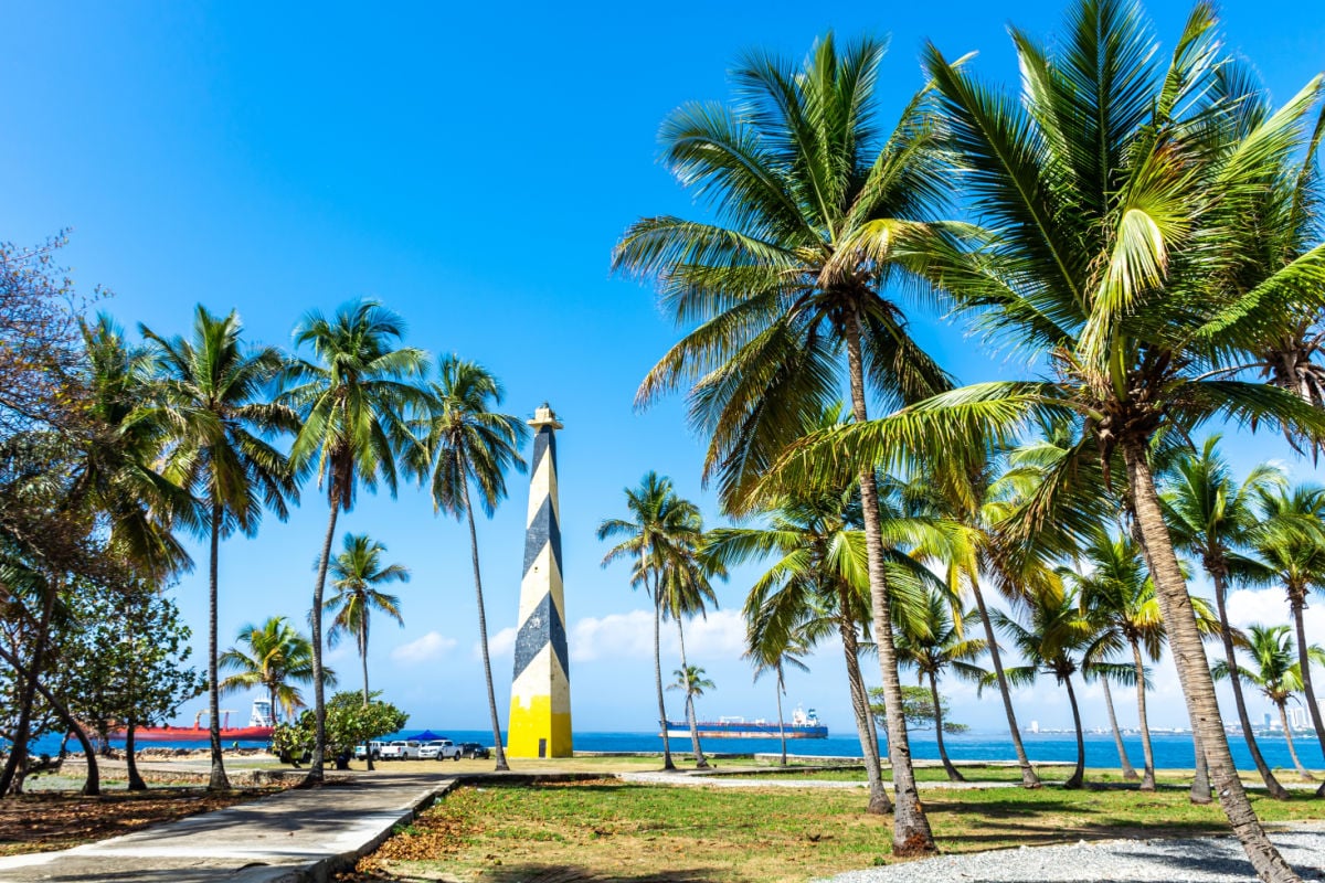 Dominican Republic Santo Domingo, beautiful Caribbean sea coast with turquoise water and palm trees