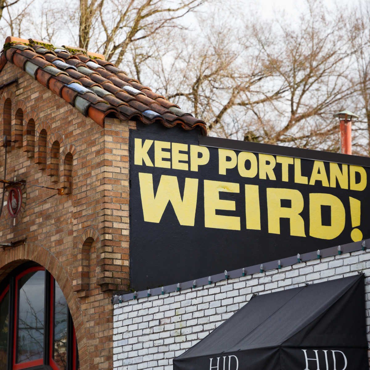 Keep Portland Weird mural above indy shop