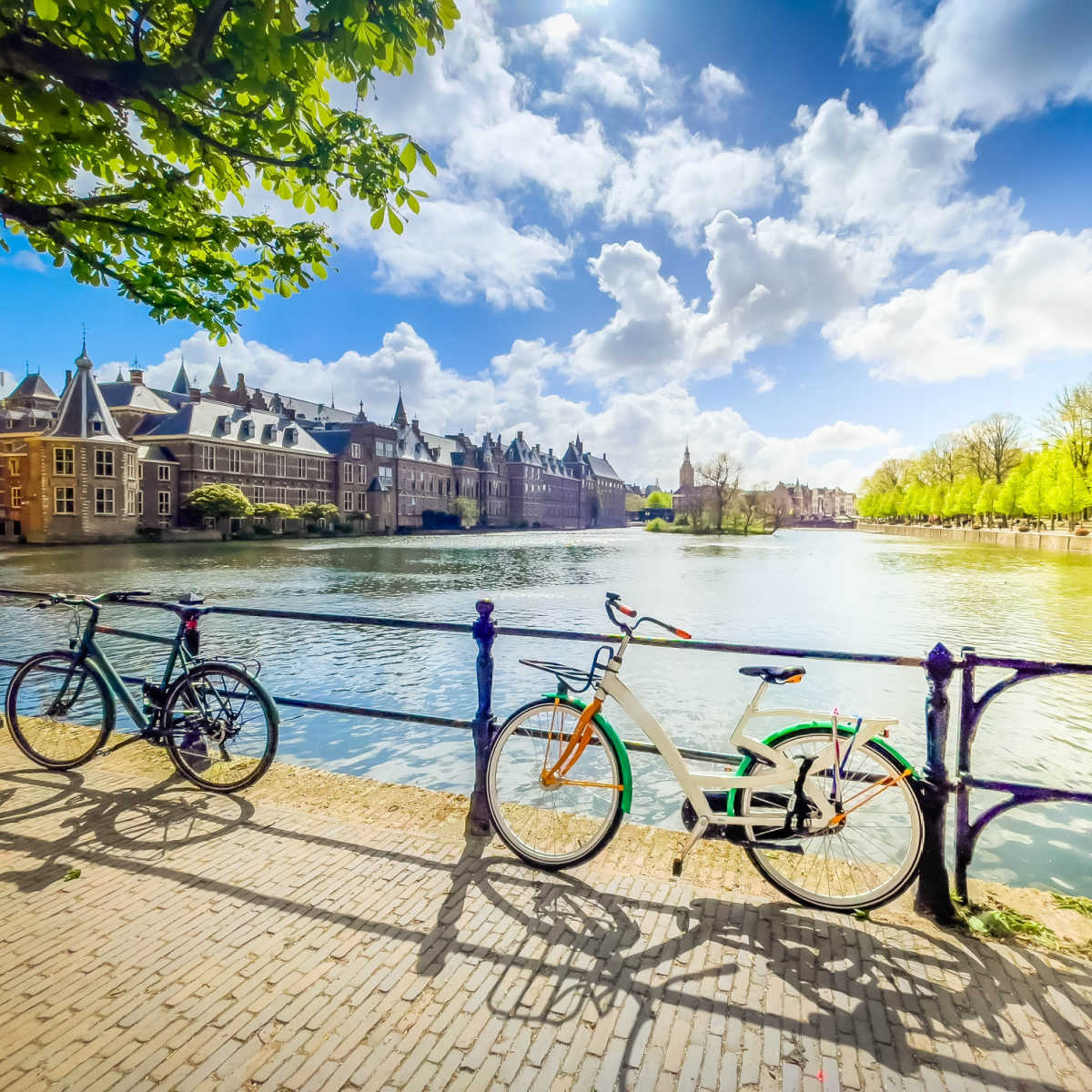 Parked bikes along canal in The Hague