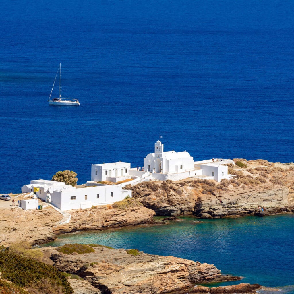 Whitewashed Chapel On A Peninsula In Sifnos, Greece