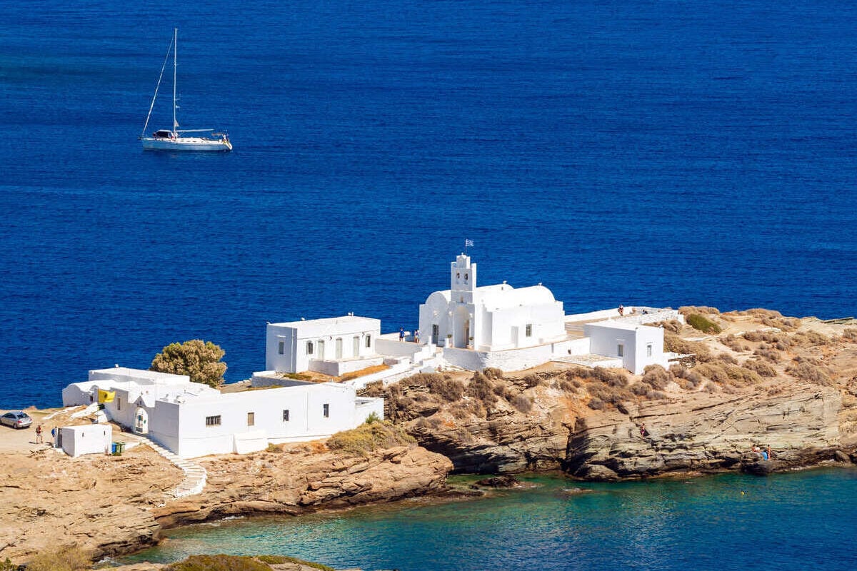 Whitewashed Chapel On A Peninsula In Sifnos, Greece