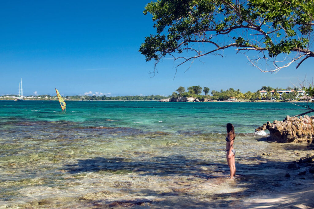 Female tourist admiring Jamaica's blue waters