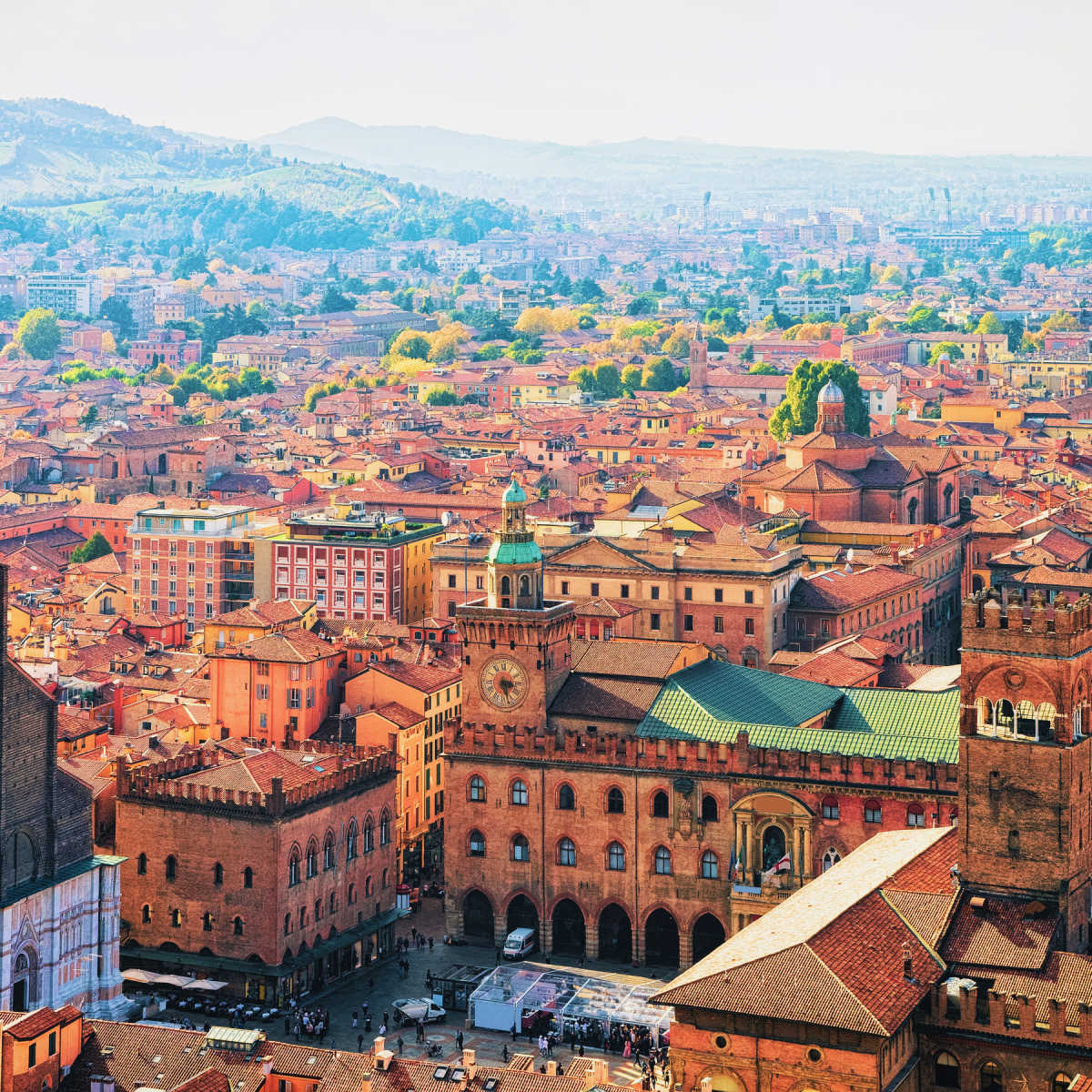 Red-tinted cityscape of Bologna, Italy